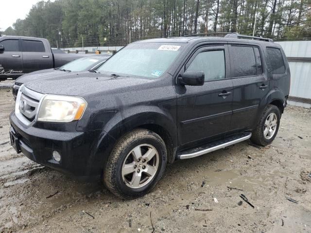 HONDA PILOT EXLN 2011 with VIN 5FNYF4H75BB083200 - Photo from auction