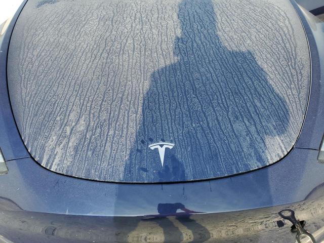 Photo 11 from auction – 2023 TESLA MODEL Y with VIN 7SAYGDEE6PA106832
