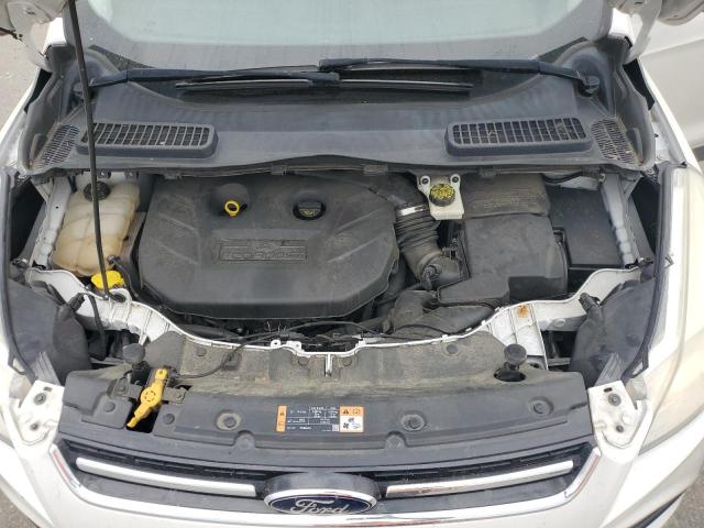 Photo 12 from auction – 2014 FORD ESCAPE TIT with VIN 1FMCU9J9XEUA95021