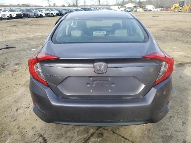 Photo 6 from auction – 2017 HONDA CIVIC LX with VIN 2HGFC2F5XHH557409