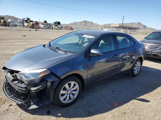 TOYOTA COROLLA L 2014 with VIN 5YFBURHE3EP171114 - Photo from auction