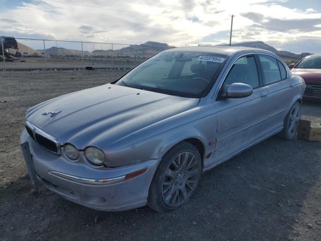 JAGUAR X-TYPE 2.5 2003 with VIN SAJEA51D63XD06766 - Photo from auction