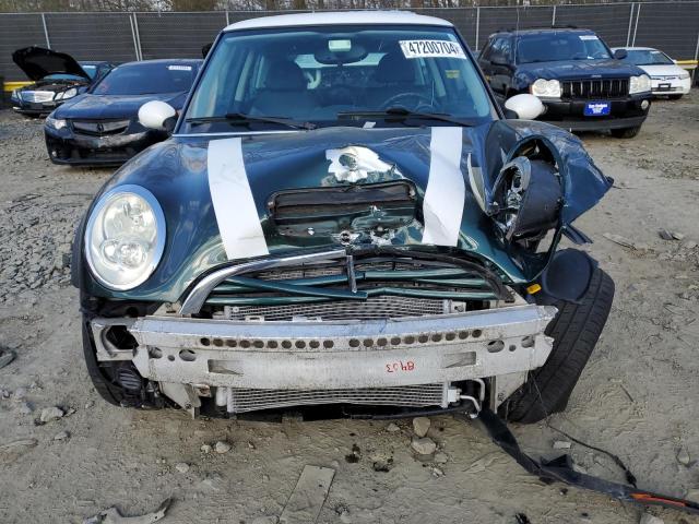 Photo 11 from auction – 2006 MINI COOPER S with VIN WMWRE33586TN27287