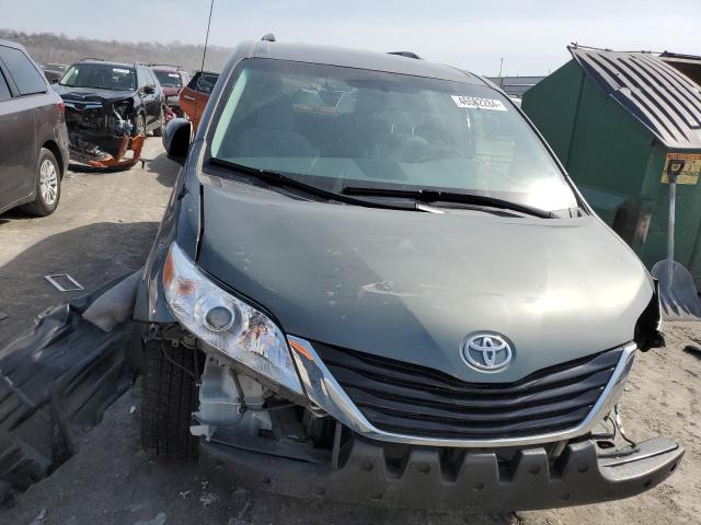 Photo 5 from auction – 2014 TOYOTA SIENNA LE with VIN 5TDKK3DC2ES519709