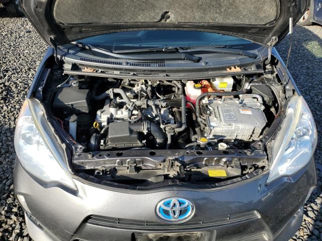 Photo 11 from auction – 2014 TOYOTA PRIUS C with VIN JTDKDTB34E1074531