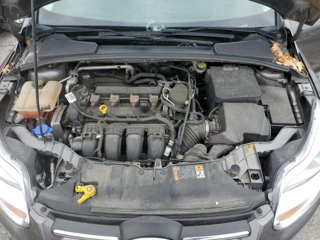 Photo 11 from auction – 2014 FORD FOCUS SE with VIN 1FADP3F20EL460701