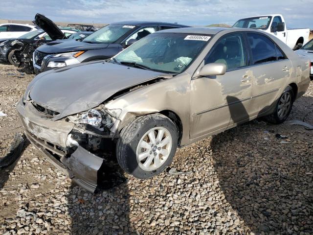 TOYOTA CAMRY LE 2002 with VIN 4T1BF30KX2U537606 - Photo from auction