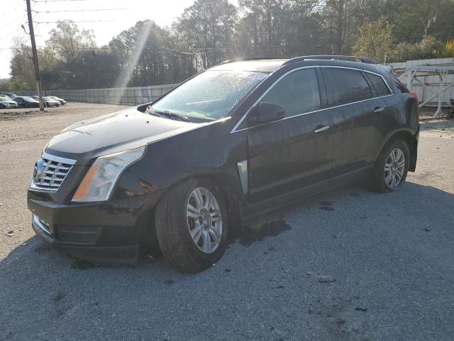 CADILLAC SRX 2015 with VIN 3GYFNAE32FS636984 - Photo from auction