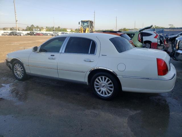 Photo 2 from auction – 2004 LINCOLN TOWN CAR E with VIN 1LNHM81W44Y683123