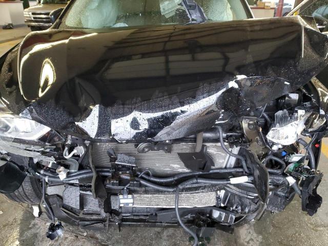 Photo 12 from auction – 2015 NISSAN ROGUE S with VIN 5N1AT2MV5FC846933