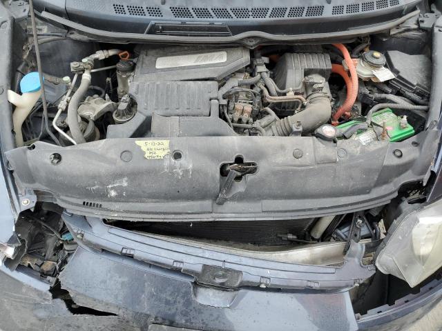 Photo 11 from auction – 2006 HONDA CIVIC HYBR with VIN JHMFA36286S022843