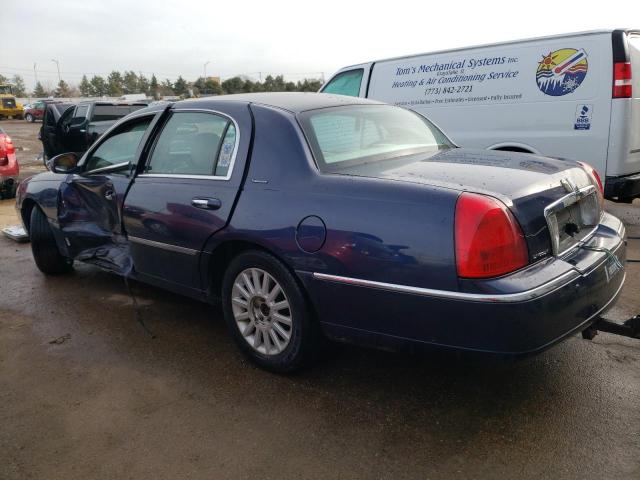 Photo 2 from auction – 2004 LINCOLN TOWN CAR E with VIN 1LNHM81W94Y631289