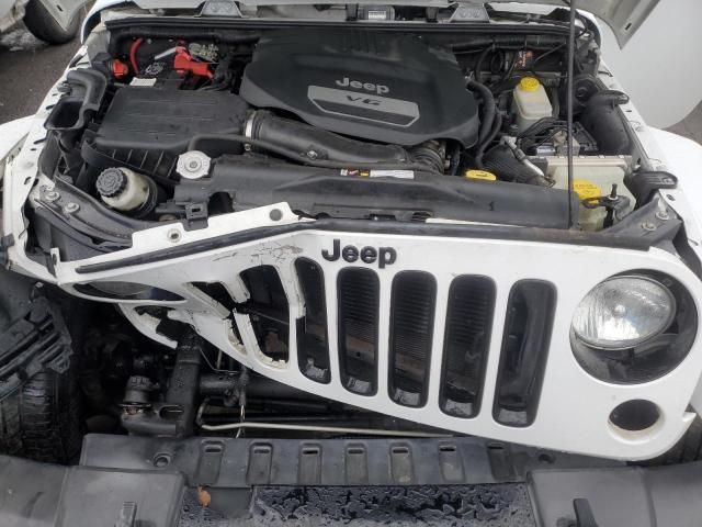 Photo 11 from auction – 2014 JEEP WRANGLER S with VIN 1C4AJWBG2EL170638