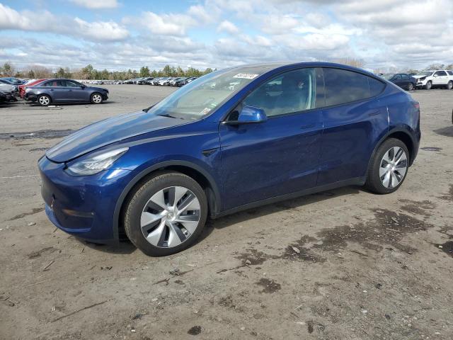 TESLA MODEL Y 2023 with VIN 7SAYGDEEXPA120507 - Photo from auction