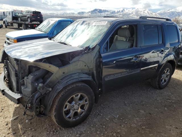 HONDA PILOT TOUR 2010 with VIN 5FNYF3H81AB003828 - Photo from auction