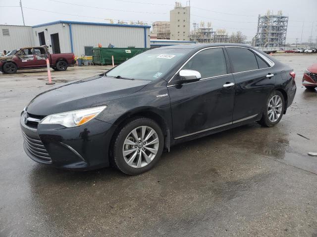 TOYOTA CAMRY HYBR 2015 with VIN 4T1BD1FK3FU146935 - Photo from auction