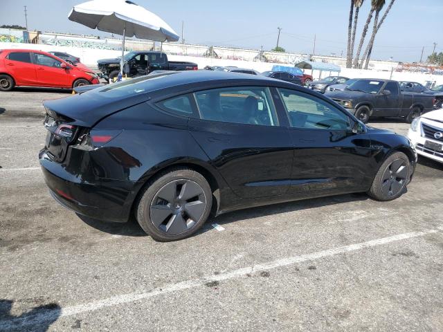 Photo 3 from auction – 2021 TESLA MODEL 3 with VIN 5YJ3E1EA0MF053147