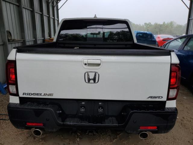 Photo 6 from auction – 2022 HONDA RIDGELINE with VIN 5FPYK3F79NB034568