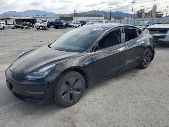 TESLA MODEL 3 2018 with VIN 5YJ3E1EA5JF051857 - Photo from auction