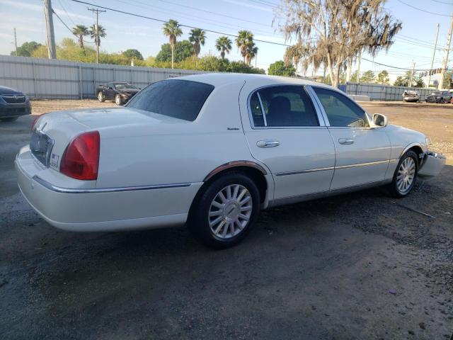 Photo 3 from auction – 2004 LINCOLN TOWN CAR E with VIN 1LNHM81W44Y683123