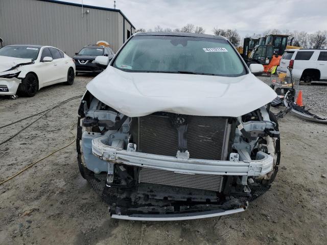 Photo 5 from auction – 2021 FORD EDGE TITAN with VIN 2FMPK3K98MBA57911