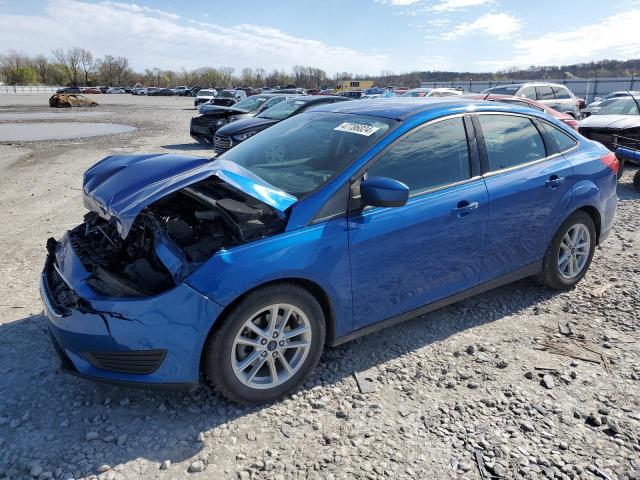 FORD FOCUS SE 2018 with VIN 1FADP3F21JL264695 - Photo from auction
