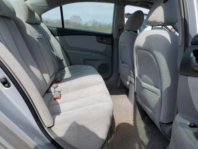 Photo 10 from auction – 2006 KIA OPTIMA LX with VIN KNAGE124965024456