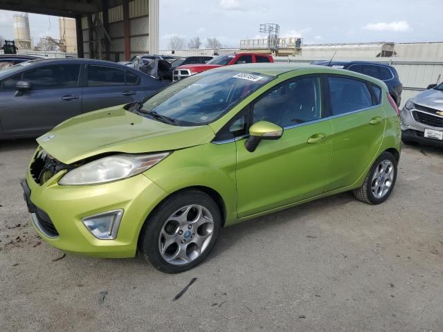 FORD FIESTA SES 2011 with VIN 3FADP4FJ0BM122318 - Photo from auction