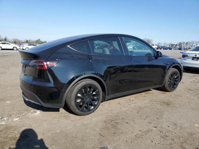 Photo 3 from auction – 2023 TESLA MODEL Y with VIN 7SAYGAEE5PF980509