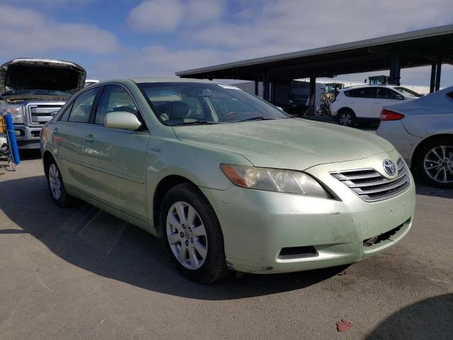 Photo 4 from auction – 2007 TOYOTA CAMRY HYBR with VIN JTNBB46K073033359