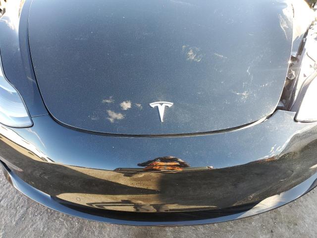 Photo 11 from auction – 2022 TESLA MODEL 3 with VIN 5YJ3E1EB0NF137835
