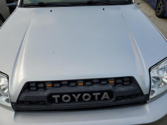 Photo 11 from auction – 2004 TOYOTA 4RUNNER SR with VIN JTEZU14R148022716