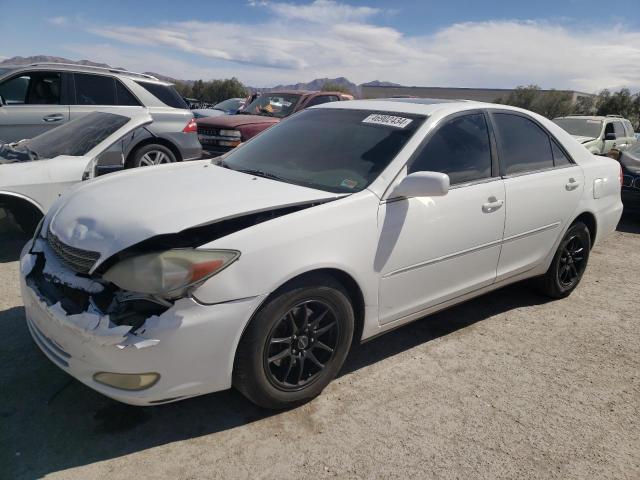 TOYOTA CAMRY LE 2003 with VIN 4T1BF32KX3U048976 - Photo from auction