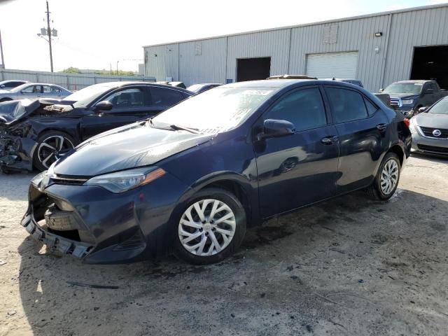 TOYOTA COROLLA L 2019 with VIN 5YFBURHE3KP885028 - Photo from auction