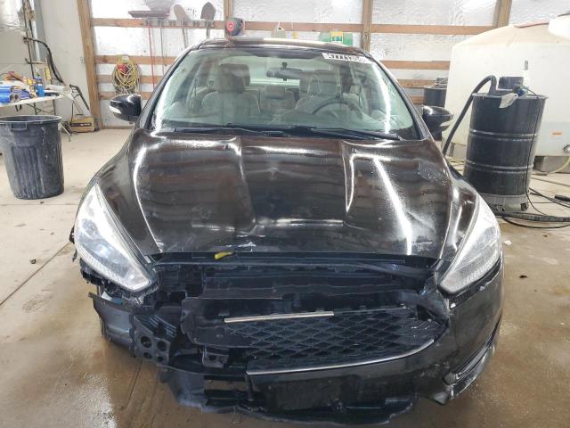 Photo 5 from auction – 2016 FORD FOCUS SE with VIN 1FADP3F21GL224755