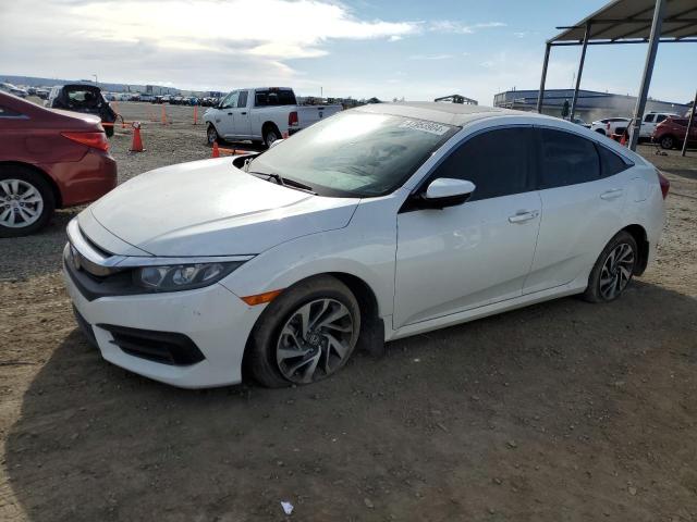 HONDA CIVIC EX 2018 with VIN 2HGFC2F75JH529170 - Photo from auction