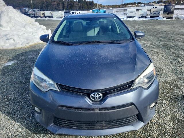Photo 5 from auction – 2014 TOYOTA COROLLA EC with VIN 2T1BPRHE8EC034578