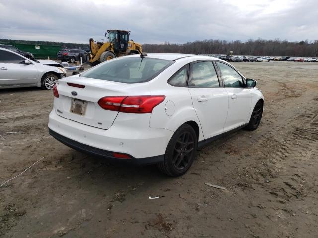 Photo 3 from auction – 2016 FORD FOCUS SE with VIN 1FADP3F21GL330204
