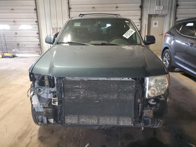 Photo 5 from auction – 2011 FORD ESCAPE LIM with VIN 1FMCU0EG2BKC30617