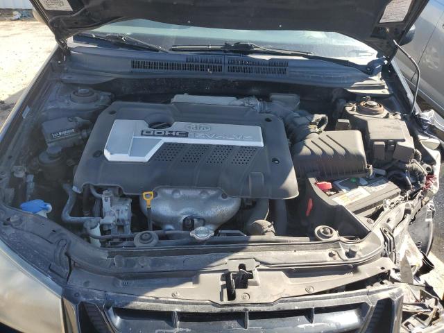 Photo 11 from auction – 2006 KIA SPECTRA LX with VIN KNAFE121965334074