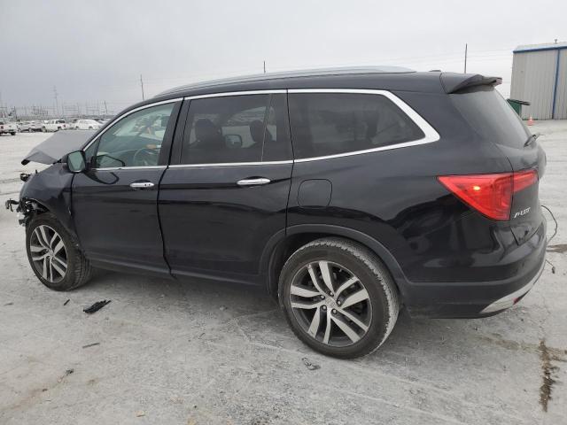 Photo 2 from auction – 2016 HONDA PILOT TOUR with VIN 5FNYF6H98GB092901