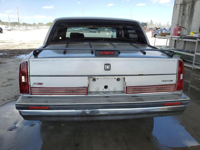 Photo 6 from auction – 1990 OLDSMOBILE 98 REGENCY with VIN 1G3CX54C2L4338913