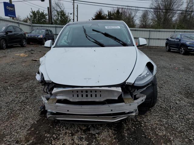 Photo 5 from auction – 2022 TESLA MODEL Y with VIN 7SAYGDEEXNF438546