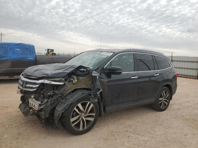 Photo 1 from auction – 2017 HONDA PILOT TOUR with VIN 5FNYF5H90HB002801