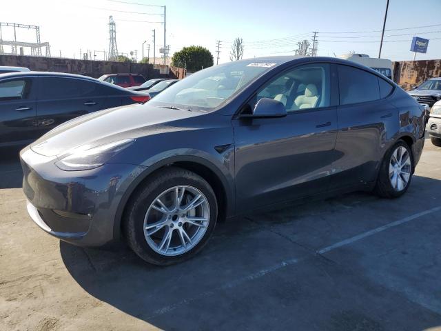 TESLA MODEL Y 2023 with VIN 7SAYGDED7PF949576 - Photo from auction