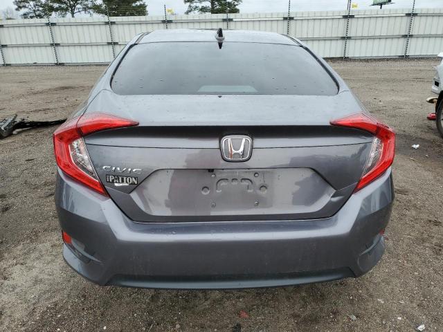 Photo 6 from auction – 2018 HONDA CIVIC EX with VIN 19XFC2F84JE032338