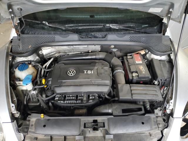 Photo 11 from auction – 2014 VOLKSWAGEN BEETLE with VIN 3VWF17AT1EM652085
