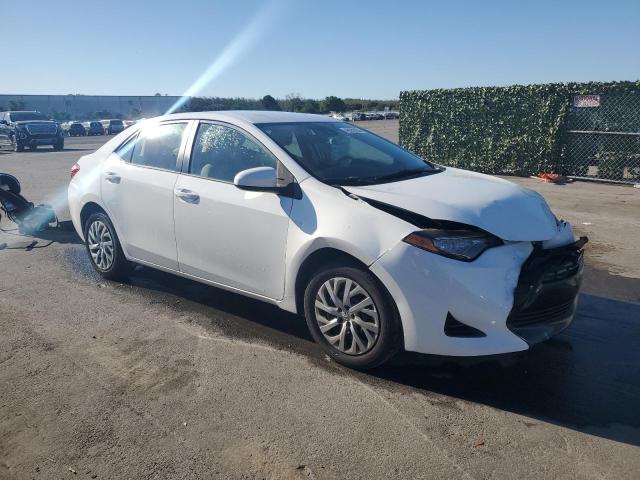 Photo 4 from auction – 2017 TOYOTA COROLLA L with VIN 5YFBURHE9HP584532