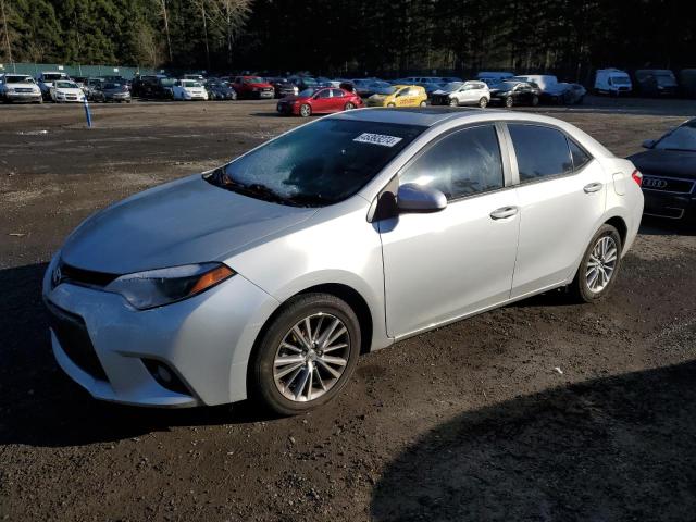 TOYOTA COROLLA L 2015 with VIN 2T1BURHE1FC428854 - Photo from auction