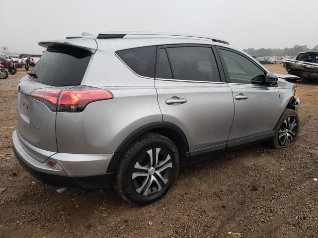 Photo 3 from auction – 2018 TOYOTA RAV4 LE with VIN JTMZFREV2JJ174730